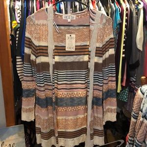 Size small Pink rose hooded sweater.